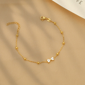 Pulsera minimalista <span class=keywords><strong>de</strong></span> acero inoxidable chapada en <span class=keywords><strong>oro</strong></span> <span class=keywords><strong>de</strong></span> 18K sin deslustre, pulsera con abalorio <span class=keywords><strong>de</strong></span> cuentas <span class=keywords><strong>de</strong></span> lazo <span class=keywords><strong>de</strong></span> circón blanco a la moda <span class=keywords><strong>para</strong></span> mujeres y <span class=keywords><strong>niñas</strong></span> - Product Image 2
