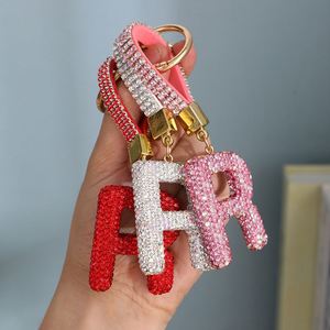 Porte-clés de voiture et pendentif de sac pour femme en céramique avec lettres anglaises et strass, vente en gros d'usine, cadeau jouet très populaire - Product Image 3