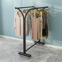 Portants de vêtements modernes et écologiques Mr19, double face, vente directe d'usine, détachables avec roulettes pour les magasins de vêtements