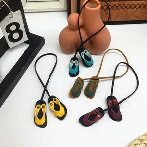 Leather flip-flop shaped <b>bag</b> <b>charm</b>, vintage flip-flop <b>bag</b> accessory rope, tassel keychain leather pendant - Product Image 1
