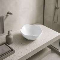 Lavabo rond design moderne en porcelaine artistique pour salle de bain d'hôtel