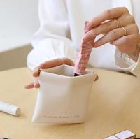 Pochette à lèvres miniature en cuir imperméable de luxe personnalisée, trousse de toilette de voyage en PU, sac à cosmétiques