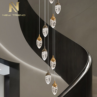 Lustre suspendu en cristal LED de luxe sur mesure pour la décoration intérieure de villas, hôtels, halls d'entrée, chambres et escaliers