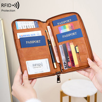 Portefeuille de voyage multifonctionnel OEM en PU, anti-RFID, avec fermeture éclair magnétique, pour passeport, billet d'avion et documents