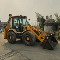 Chargeuse-pelleteuse JCB 4CX d'occasion à faible nombre d'heures, années 2021-2023, durable, 4x4, pour travaux de terrassement, à vendre