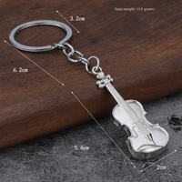 Vente en gros usine : Porte-clés en alliage de zinc, motifs guitare et violon rétro, pendentifs décoratifs pour bijoux, style moderne minimaliste, pour le marché international