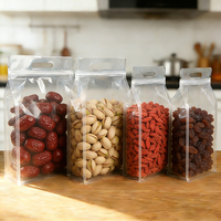 Sac d'emballage alimentaire refermable en plastique transparent brillant à fond plat à huit côtés avec poignée pour les noix