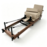 Vente en gros de Reformer Pilates pliable haut de gamme, machine de fitness pour salle de sport, Reformer Pilates pliable en bois de noyer pour studio