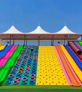 Popolare giocattolo colorato dipinto parco divertimenti parco giochi all'aperto arcobaleno scivolo di plastica pneumatici colorati per lo scivolo ostacolo di formazione