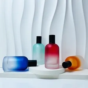 新しいデザインのカスタムマットフロストスクリーン印刷レインボーカラフルな丸い形の空の詰め替え可能な香水瓶