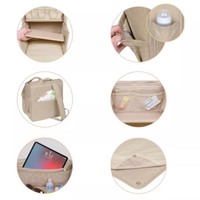 Sac à dos multifonctionnel pour bébé, idéal pour les sorties et le quotidien, avec double bandoulière et fixation pour poussette, porte-bouteille et matelas à langer.