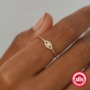 แหวนหมั้นโอปอลรูปตาประดับเพชรซิคอน เงินแท้ 925 จาก CANNER Fine Jewelry แหวนโอปอลชุบทอง 18K สุดหรูสำหรับผู้หญิง - Product Image 6