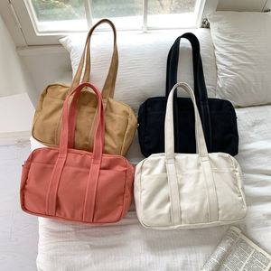 กระเป๋าผ้าใบทรงกระบอกน้ำหนักเบาสำหรับผู้ชายสีน้ำตาลขนาดใหญ่  กระเป๋ากีฬาออกกำลังกายสำหรับผู้หญิงสีชมพูเรียบง่าย - Product Image 1