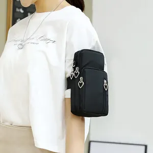 Water repellent nylon fabric mini messenger shoulder bag Customized multifunctional mobile phone earphone outdoor sports bag