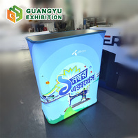 Nouvelle Arrivée - Comptoir Promotionnel Portable Personnalisé Pliant avec Housse en Tissu Tendu et Éclairage LED pour Salons Professionnels
