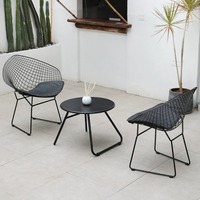 Ensemble table et chaises de salle à manger de forme géométrique moderne, cadre en fer forgé, pieds en alliage d'aluminium, tissu imperméable, finition résistante aux rayures