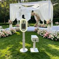 Photobooth ovale 2026 pour iPad, machine photo DSLR pour mariages et fêtes avec flight case