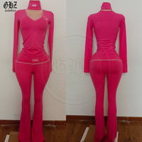 Ensemble 4 pièces grande taille 2026 avec contraste de couleurs : haut court à manches longues, pantalon évasé, soutien-gorge dos nu et bandeau – Tenue décontractée et sportive pour femme