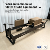 Fabricant de machine de Pilates Reformer en contreplaqué avec système de tour et barre de repose-pieds réglable pour studio et usage domestique