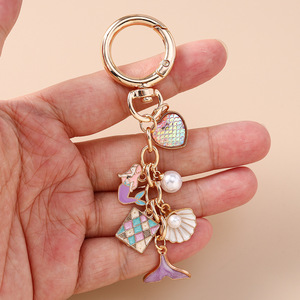Llavero de lujo con diseño de perlas y temática oceánica, con escamas de sirena, corazón y estrella de mar, para mujer, colgante para bolso, venta al por mayor - Product Image 5