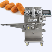 Nouvelle machine industrielle de haute qualité 2025 à double vis pour l'enrobage de biscuits, croquettes et aliments fourrés au cristal 220V Yucheng