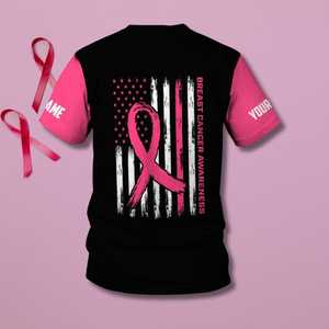 เสื้อรณรงค์รณรงค์มะเร็งเต้านมพร้อมริบบิ้นสีชมพูและธงชาติอเมริกัน เสื้อยืดพิมพ์ชื่อตามสั่งสำหรับผู้ต่อสู้และผู้หญิงที่แข็งแกร่ง เป็นของขวัญ - Product Image 1