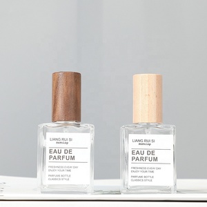 Botol Parfum Kosong Kaca Bening Portabel 15ml Dengan Sprayer Botol Semprot Parfum Kaca Isi Ulang Elegan Dengan Tutup Kayu - Product Image 1