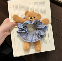 Bandeau pour cheveux en forme d'ours pour filles avec un design en peluche mignon. Un accessoire pour cheveux en queue de cheval longue. Un accessoire capillaire polyvalent