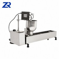 Machine industrielle automatique à gaz de haute qualité pour la fabrication et la friture de mini-beignets glacés, modèle Commercial Orbits Donut, à vendre