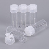 Petites bouteilles rondes en plastique à paillettes de 23 mm de large sur 65 mm de haut avec couvercle double ouvert blanc