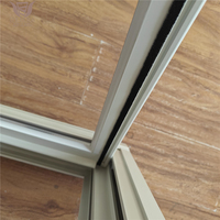 Fenêtre coulissante en aluminium à rupture de pont thermique, insonorisée et sécurisée, avec dimensions personnalisées pour sous-sol et construction de maisons neuves