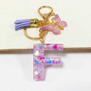 Púrpura copo de nieve corazón resina lentejuelas epoxi acrílico llavero inglés letra diseño estudiante <span class=keywords><strong>mujer</strong></span> bolso encanto colgante - Product Image 4