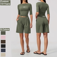 Set Yoga Wanita Terbaru Slim Fit Atasan Lengan Setengah Panjang Celana Pendek Olahraga Pinggang Tinggi Model Kaki Lebar Bahan Stretch Lembut untuk Fitness dan Lari