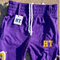 Pantalon de jogging HUITENG personnalisé à taille haute, imprimé avec logo, garniture à rivets perlés, coupe droite, double poches arrière, effet délavé et usé