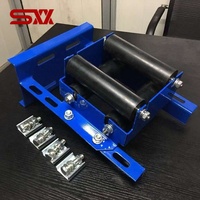 Dispositif de guidage à rouleaux pour chaîne de compensation d'ascenseur, stabilisateur anti-oscillation en caoutchouc, guide de chaîne compensatrice pour ascenseur à structure ouverte