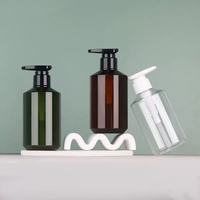Nouvel arrivage : Bouteille en plastique marron à épaule diagonale 500 ml, et flacon pompe en PET vert 300 ml pour shampoing et lotion