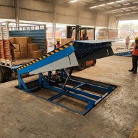 Plateforme élévatrice électrique inclinable JINMEITE avec jambes en ciseaux, matériau Q345, capacité 200 kg, hauteur de plateforme 18 m