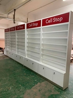 Vitrine de présentation en verre pour téléphones portables, idéale pour les magasins de réparation de téléphones, les boutiques de téléphonie mobile et les espaces de vente au détail.