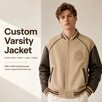 Blouson universitaire personnalisé avec badge en relief, manches en cuir contrastant, bordure rayée, coupe oversize épaisse, kaki, style minimaliste