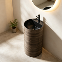 Lavabo sur colonne rond en marbre brun à effet superposé, monobloc autoportant, avec robinet mitigeur haut noir pour hôtel et villa