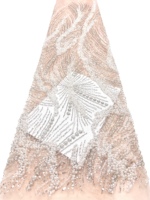 Tissus en dentelle brodée uniques avec motif floral à paillettes pour robes de soirée et vêtements de fête