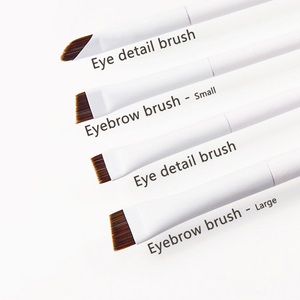 Lot de 4 pinceaux de maquillage vegan blancs et noirs : pinceau plat pour fard à paupières, pinceau eyeliner, pinceau à sourcils, pinceau biseauté en nylon - Product Image 3