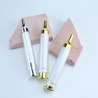 Bouteilles à pompe sans air durables et légères Stylo à crème pour les yeux de 10ml Tube à double paroi de couleur personnalisée Seringue à bouteille sans air