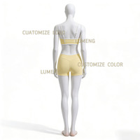 Vêtements de sport pour femmes : Ensemble de yoga avec soutien-gorge dos ouvert et short taille en V, motif cœur et blocs de couleur