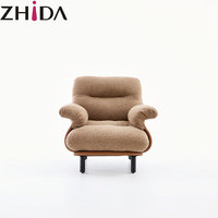 Fauteuil lounge rond en peluche marron Zhida, moderne, luxueux, écologique, de haute qualité, avec détails en cuir et pieds noirs