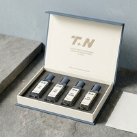Boîte à parfum rigide de luxe personnalisée, style livre blanc magnétique, pour quatre flacons, emballage cosmétique écologique