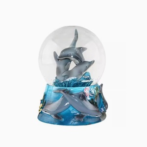 Globo de nieve de delfín de resina personalizado música Año Nuevo regalo de Navidad patrón de animales copo de nieve eléctrico globo de nieve de Navidad personalizado - Product Image 1
