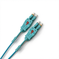 KABEL PATCH FIBER OPTIK COMTON Uniboot LC LC Multimode OM4 50um AQUA LSZH/PVC Push-Pull Tab Polaritas Dapat Dibalik untuk FTTH FTTB