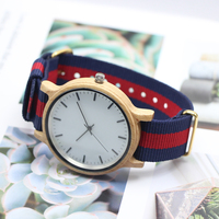 Montre en bois de bambou naturel, bracelet en nylon minimaliste, boucle dorée, unisexe, ultra légère, écologique, bracelet remplaçable, étanche