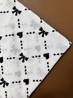 Tissu en coton brodé ajouré à motifs cœurs noirs et blancs, semi-transparent, pour robes, broderie personnalisée, fournisseur en gros